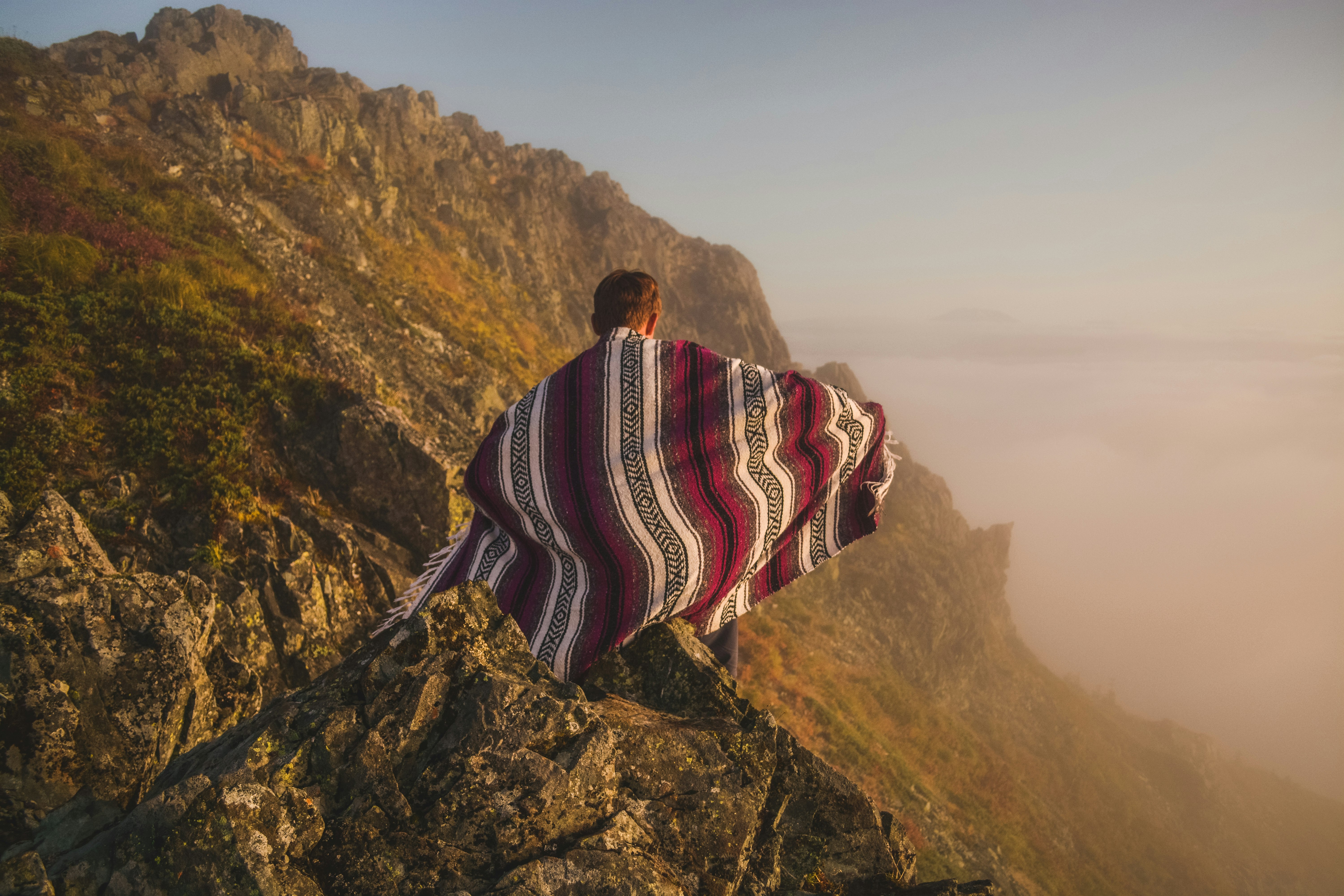 person on top of mountain